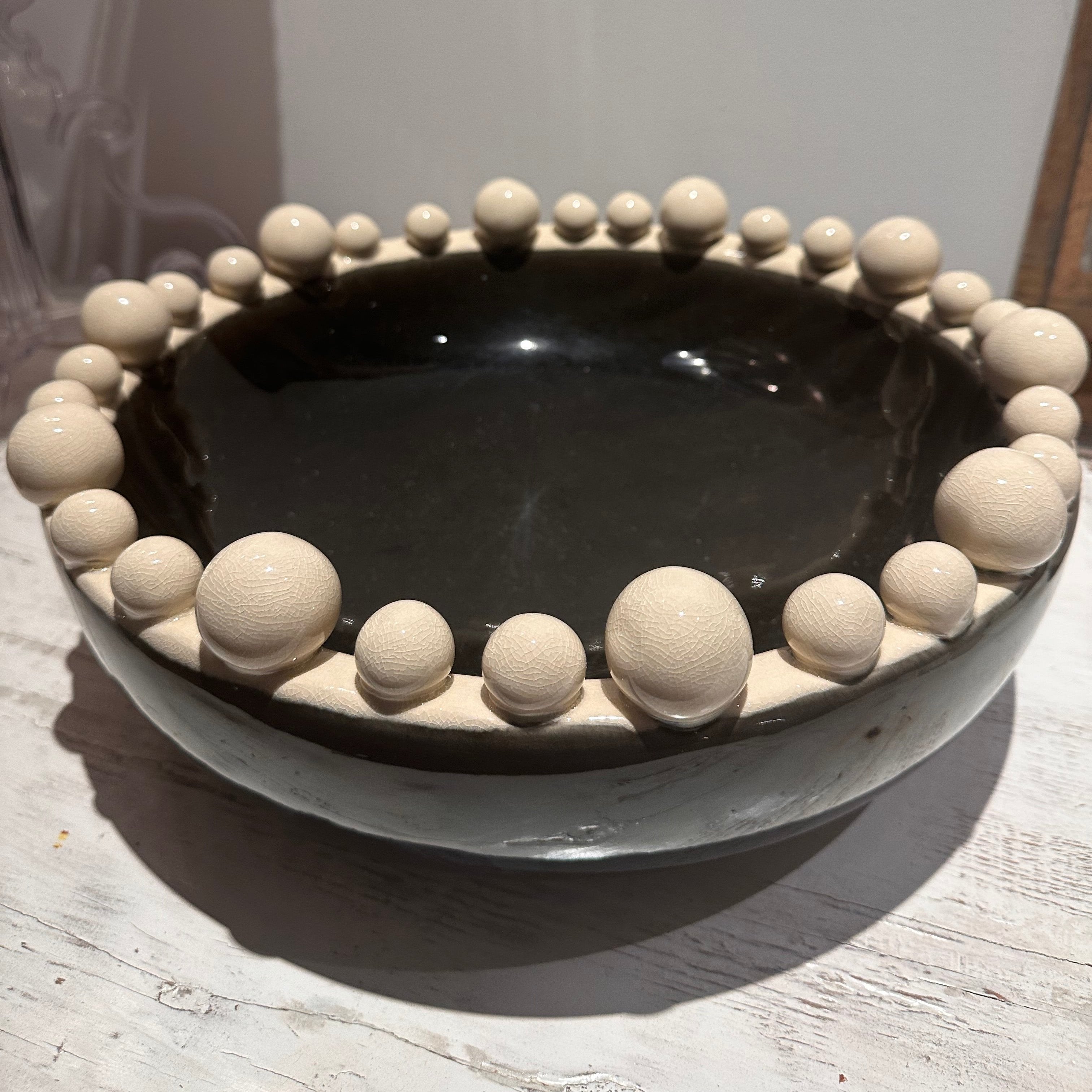 Decorative bobble bowl in cream and black